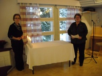 Kynttilän sytytys edesmenneille jäsenille